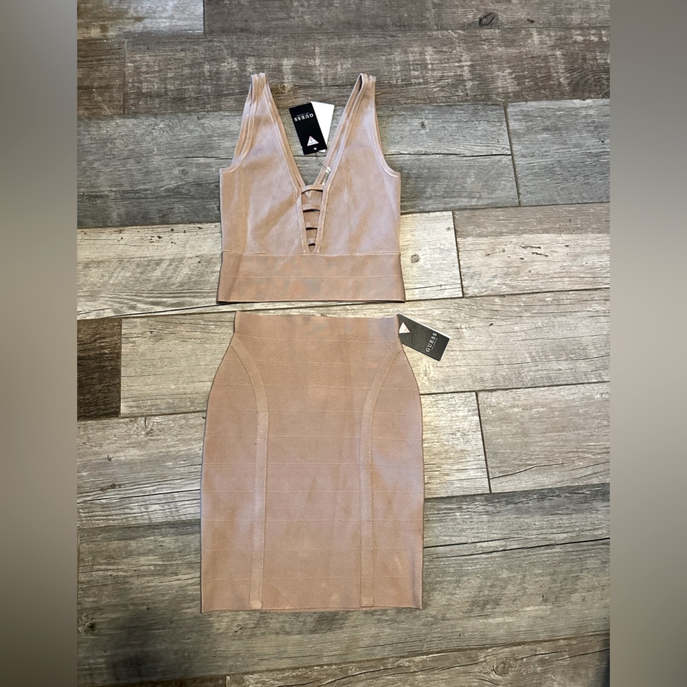 Guess mirage stitch top and skirt both new with tags. Size xs